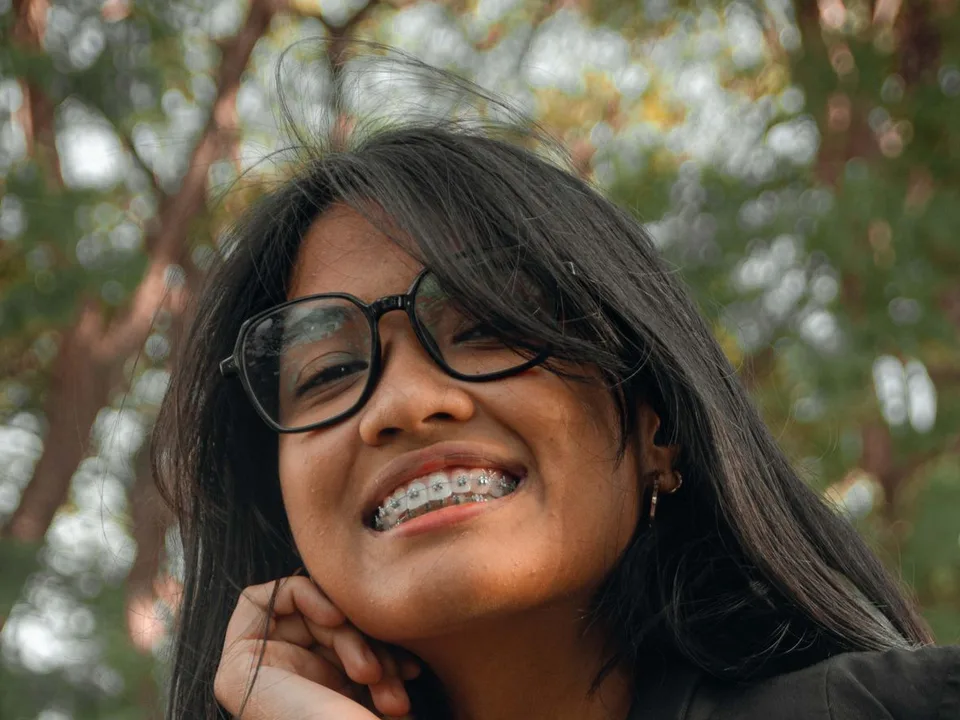 Smiling Indian teen with metal braces – braces treatment in Dombivli East